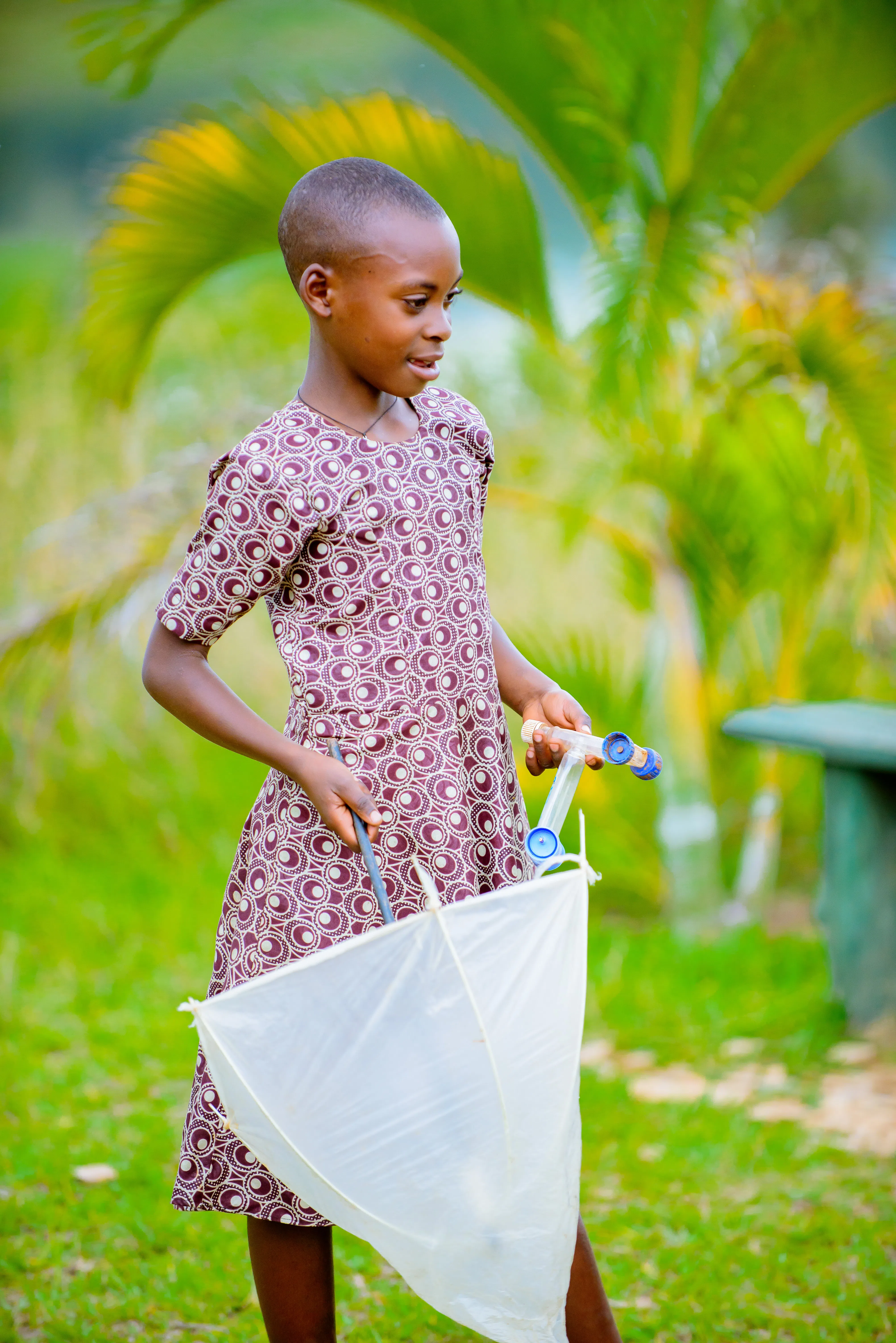 a rwandan girl wearing a dress